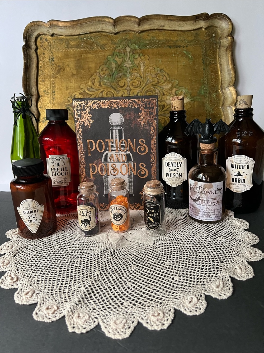 Potions and Poisons Decorative box with Nine Apothecary Bottle Set .